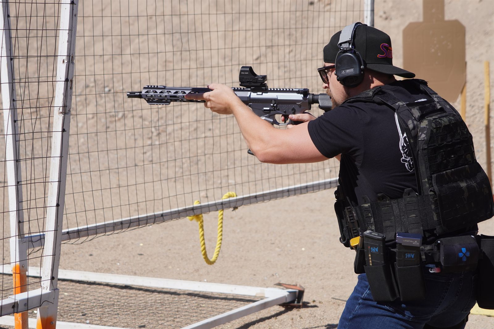 Shooter running the OD Green PHYRE15 on the range